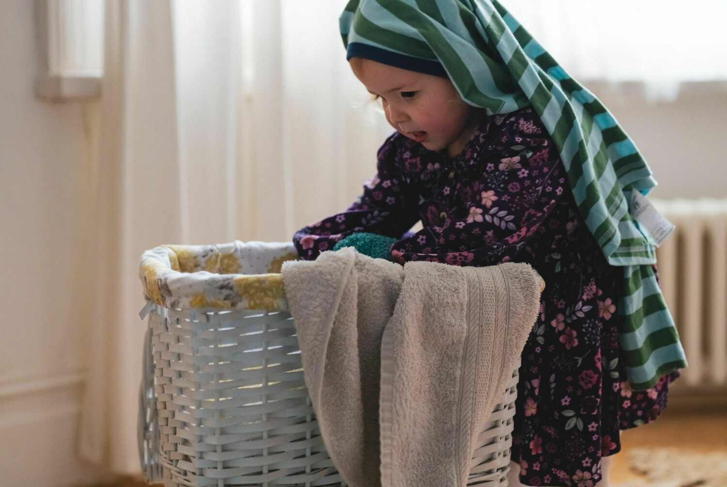 Young girl with towel on her head from childcare TV advert